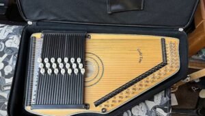 An autoharp showing How to Store Your Autoharp for Longevity.